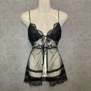 Vintage 2002 Victoria's Secret black lace lingerie with front tie detail.